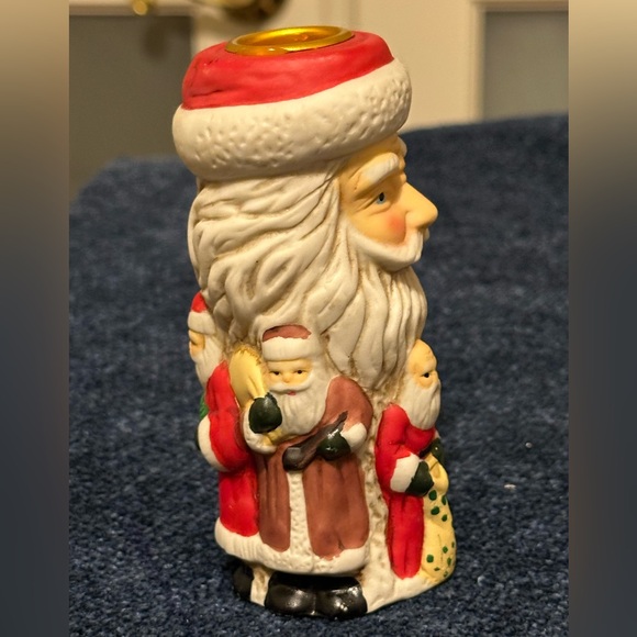 Set of 2 Santa candleholders. Each has smaller different smaller Santas. - Picture 11 of 11